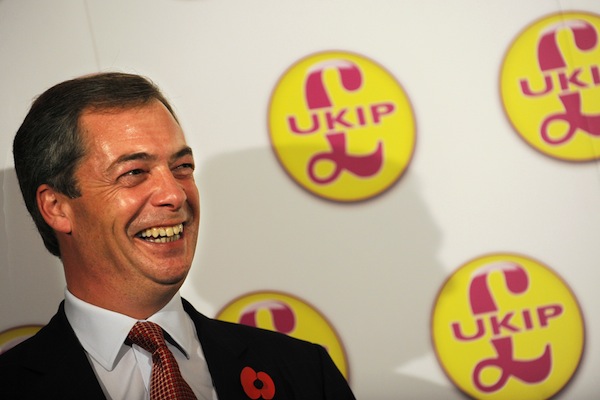 Nigel Farage reacts during a press confe