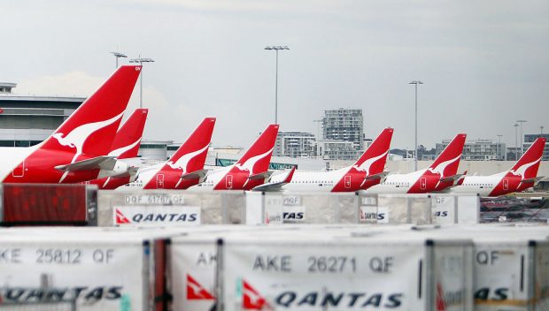 Qantas planes sit grounded at Sydney Int